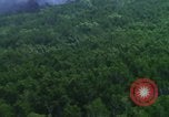 Image of air strike mission bu USAF A-1E in Vietnam Vietnam, 1965, second 16 stock footage video 65675054856