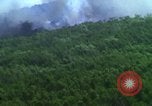 Image of air strike mission bu USAF A-1E in Vietnam Vietnam, 1965, second 18 stock footage video 65675054856