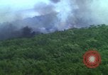 Image of air strike mission bu USAF A-1E in Vietnam Vietnam, 1965, second 19 stock footage video 65675054856