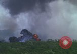 Image of air strike mission bu USAF A-1E in Vietnam Vietnam, 1965, second 23 stock footage video 65675054856