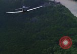 Image of air strike mission bu USAF A-1E in Vietnam Vietnam, 1965, second 44 stock footage video 65675054856