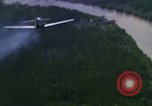 Image of air strike mission bu USAF A-1E in Vietnam Vietnam, 1965, second 49 stock footage video 65675054856