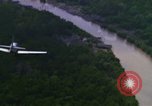 Image of air strike mission bu USAF A-1E in Vietnam Vietnam, 1965, second 55 stock footage video 65675054856