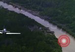 Image of air strike mission bu USAF A-1E in Vietnam Vietnam, 1965, second 56 stock footage video 65675054856