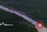 Image of air strike mission bu USAF A-1E in Vietnam Vietnam, 1965, second 57 stock footage video 65675054856