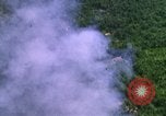 Image of USAF A-1E strafing in Vietnam War Vietnam, 1965, second 20 stock footage video 65675054857