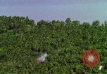 Image of USAF A-1E strafing in Vietnam War Vietnam, 1965, second 35 stock footage video 65675054857