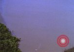 Image of A-1E aircraft dropping bombs Vietnam, 1965, second 3 stock footage video 65675054858