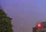 Image of A-1E aircraft dropping bombs Vietnam, 1965, second 4 stock footage video 65675054858