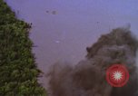 Image of A-1E aircraft dropping bombs Vietnam, 1965, second 6 stock footage video 65675054858