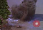 Image of A-1E aircraft dropping bombs Vietnam, 1965, second 9 stock footage video 65675054858