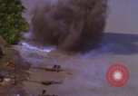 Image of A-1E aircraft dropping bombs Vietnam, 1965, second 10 stock footage video 65675054858