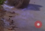 Image of A-1E aircraft dropping bombs Vietnam, 1965, second 12 stock footage video 65675054858