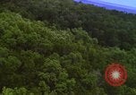 Image of A-1E aircraft dropping bombs Vietnam, 1965, second 22 stock footage video 65675054858