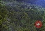 Image of A-1E aircraft dropping bombs Vietnam, 1965, second 33 stock footage video 65675054858
