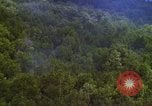 Image of A-1E aircraft dropping bombs Vietnam, 1965, second 35 stock footage video 65675054858