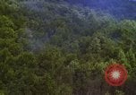Image of A-1E aircraft dropping bombs Vietnam, 1965, second 36 stock footage video 65675054858