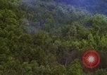 Image of A-1E aircraft dropping bombs Vietnam, 1965, second 37 stock footage video 65675054858