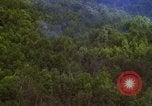 Image of A-1E aircraft dropping bombs Vietnam, 1965, second 38 stock footage video 65675054858