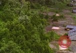Image of A-1E aircraft dropping bombs Vietnam, 1965, second 48 stock footage video 65675054858