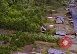 Image of A-1E aircraft dropping bombs Vietnam, 1965, second 54 stock footage video 65675054858