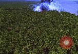 Image Vue aérienne d'explosion de bombes au phosphore blanc Guerre du Vietnam Vietnam, 1965, de la seconde 56 séquences d'archives historiques vidéo 65675054860