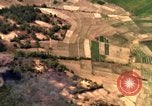 Image of bombardment of target areas in Bien Hoa Vietnam Bien Hoa Vietnam, 1965, second 13 stock footage video 65675054869