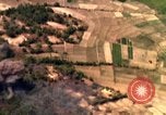 Image of bombardment of target areas in Bien Hoa Vietnam Bien Hoa Vietnam, 1965, second 15 stock footage video 65675054869
