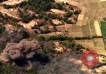 Image of bombardment of target areas in Bien Hoa Vietnam Bien Hoa Vietnam, 1965, second 19 stock footage video 65675054869