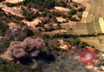 Image of bombardment of target areas in Bien Hoa Vietnam Bien Hoa Vietnam, 1965, second 20 stock footage video 65675054869
