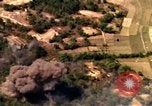 Image of bombardment of target areas in Bien Hoa Vietnam Bien Hoa Vietnam, 1965, second 22 stock footage video 65675054869