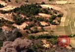 Image of bombardment of target areas in Bien Hoa Vietnam Bien Hoa Vietnam, 1965, second 23 stock footage video 65675054869