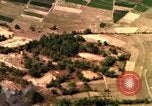 Image of bombardment of target areas in Bien Hoa Vietnam Bien Hoa Vietnam, 1965, second 24 stock footage video 65675054869
