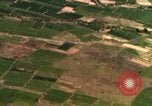 Image of bombardment of target areas in Bien Hoa Vietnam Bien Hoa Vietnam, 1965, second 27 stock footage video 65675054869