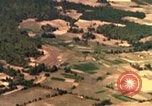 Image of bombardment of target areas in Bien Hoa Vietnam Bien Hoa Vietnam, 1965, second 30 stock footage video 65675054869
