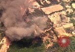 Image of bombardment of target areas in Bien Hoa Vietnam Bien Hoa Vietnam, 1965, second 33 stock footage video 65675054869