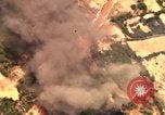 Image of bombardment of target areas in Bien Hoa Vietnam Bien Hoa Vietnam, 1965, second 36 stock footage video 65675054869