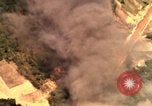 Image of bombardment of target areas in Bien Hoa Vietnam Bien Hoa Vietnam, 1965, second 39 stock footage video 65675054869
