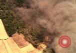 Image of bombardment of target areas in Bien Hoa Vietnam Bien Hoa Vietnam, 1965, second 42 stock footage video 65675054869