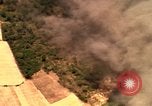 Image of bombardment of target areas in Bien Hoa Vietnam Bien Hoa Vietnam, 1965, second 44 stock footage video 65675054869