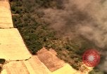 Image of bombardment of target areas in Bien Hoa Vietnam Bien Hoa Vietnam, 1965, second 45 stock footage video 65675054869