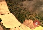 Image of bombardment of target areas in Bien Hoa Vietnam Bien Hoa Vietnam, 1965, second 48 stock footage video 65675054869