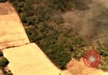 Image of bombardment of target areas in Bien Hoa Vietnam Bien Hoa Vietnam, 1965, second 49 stock footage video 65675054869