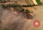 Image of bombardment of target areas in Bien Hoa Vietnam Bien Hoa Vietnam, 1965, second 54 stock footage video 65675054869