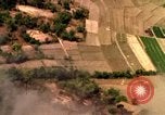 Image of bombardment of target areas in Bien Hoa Vietnam Bien Hoa Vietnam, 1965, second 55 stock footage video 65675054869