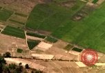 Image of bombardment of target areas in Bien Hoa Vietnam Bien Hoa Vietnam, 1965, second 57 stock footage video 65675054869