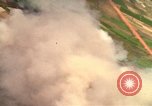 Image of American bombardment of Viet Cong positions Bien Hoa Vietnam, 1965, second 39 stock footage video 65675054870