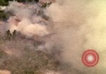 Image of American bombardment of Viet Cong positions Bien Hoa Vietnam, 1965, second 45 stock footage video 65675054870