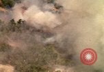 Image of American bombardment of Viet Cong positions Bien Hoa Vietnam, 1965, second 48 stock footage video 65675054870