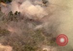 Image of American bombardment of Viet Cong positions Bien Hoa Vietnam, 1965, second 49 stock footage video 65675054870